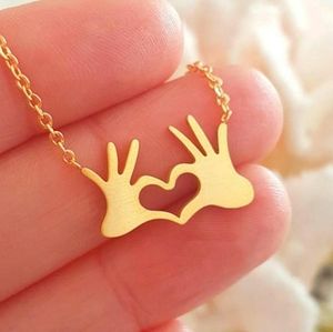 Goldtone Heart Hands Necklace